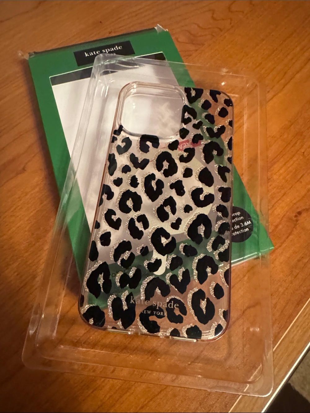 kate spade Clear Leopard Print Phone Case with Black Spots and Gold Accents